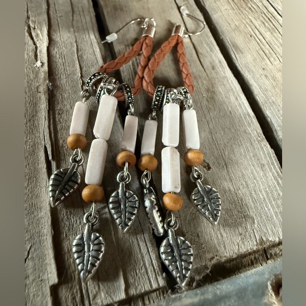Earrings with faux bone and leather silver tone leaves NWOT